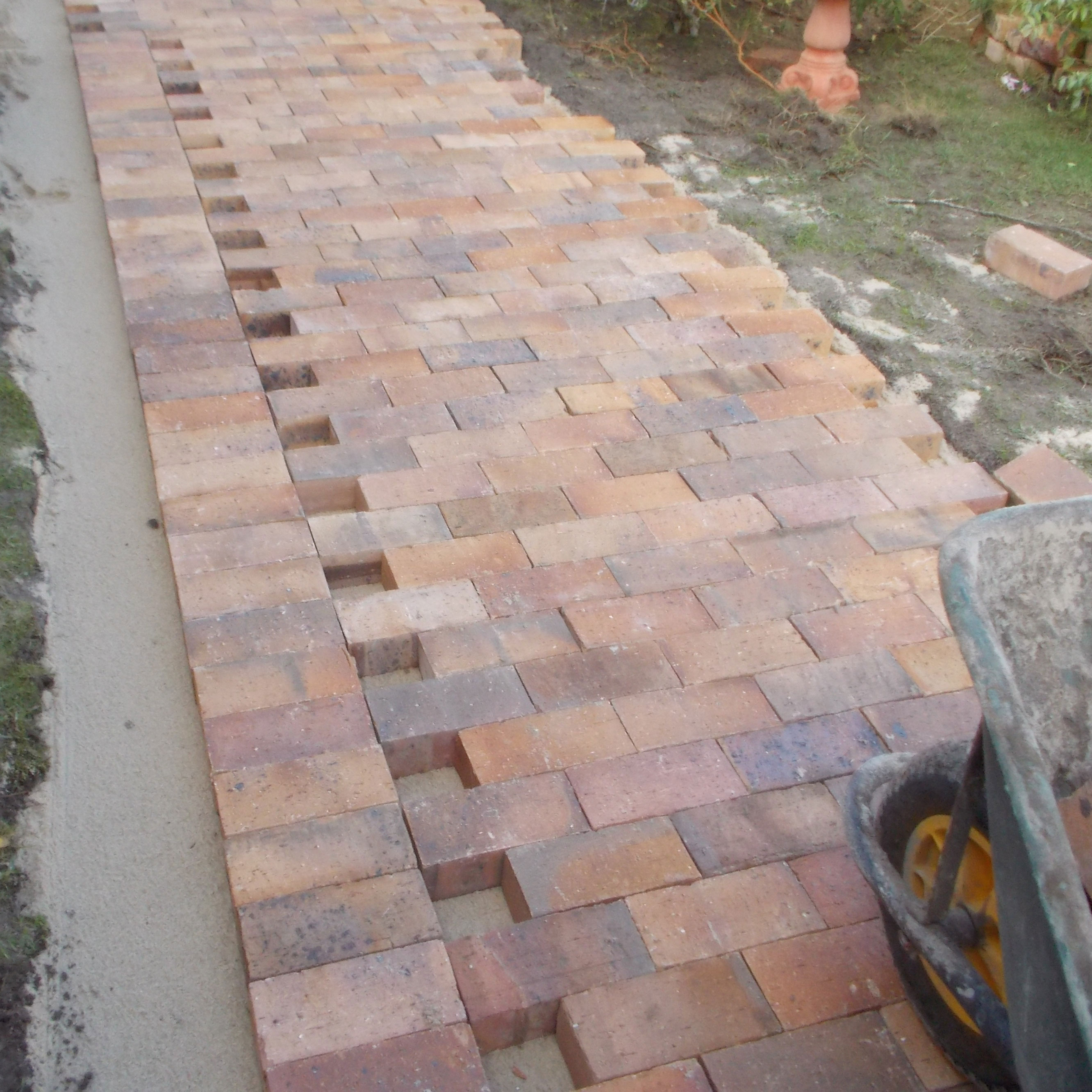 Lay some brick paving in your garden 17