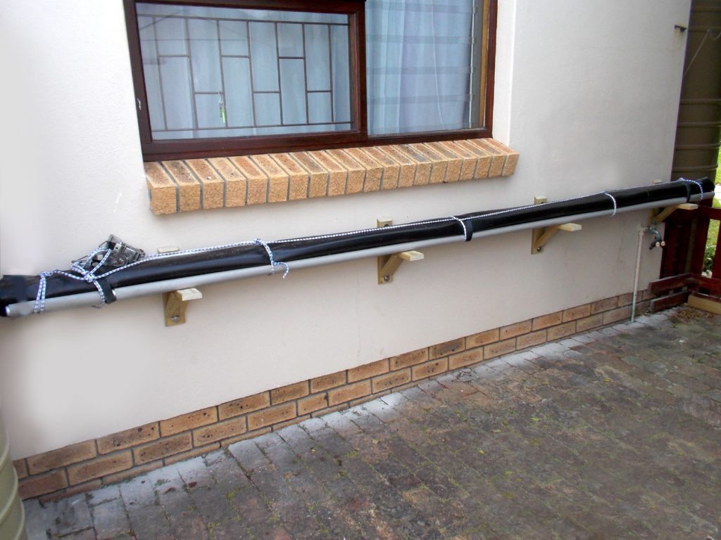 A simple pool cover storage rack